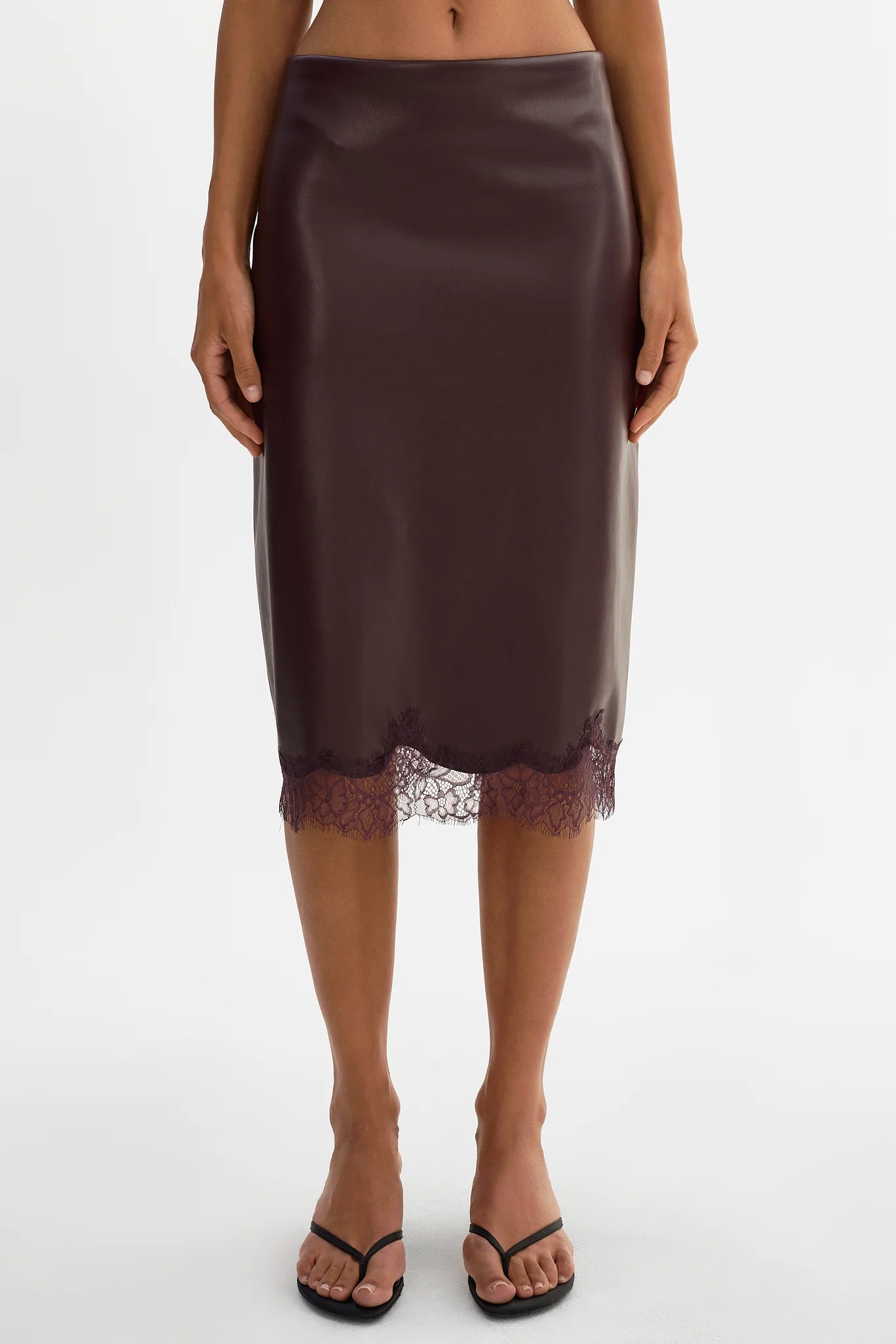 SONJA
Lace Trim Faux Leather Skirt