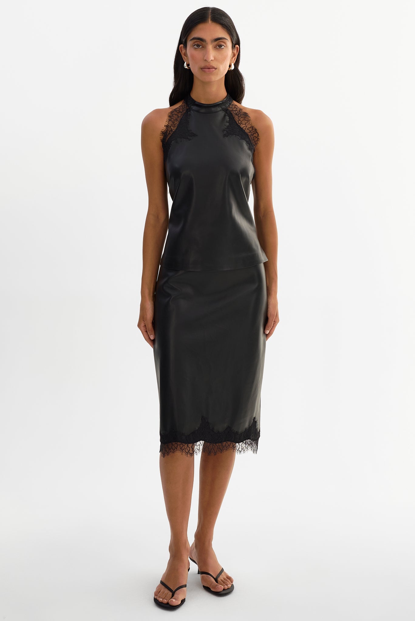 SONJA
Lace Trim Faux Leather Skirt