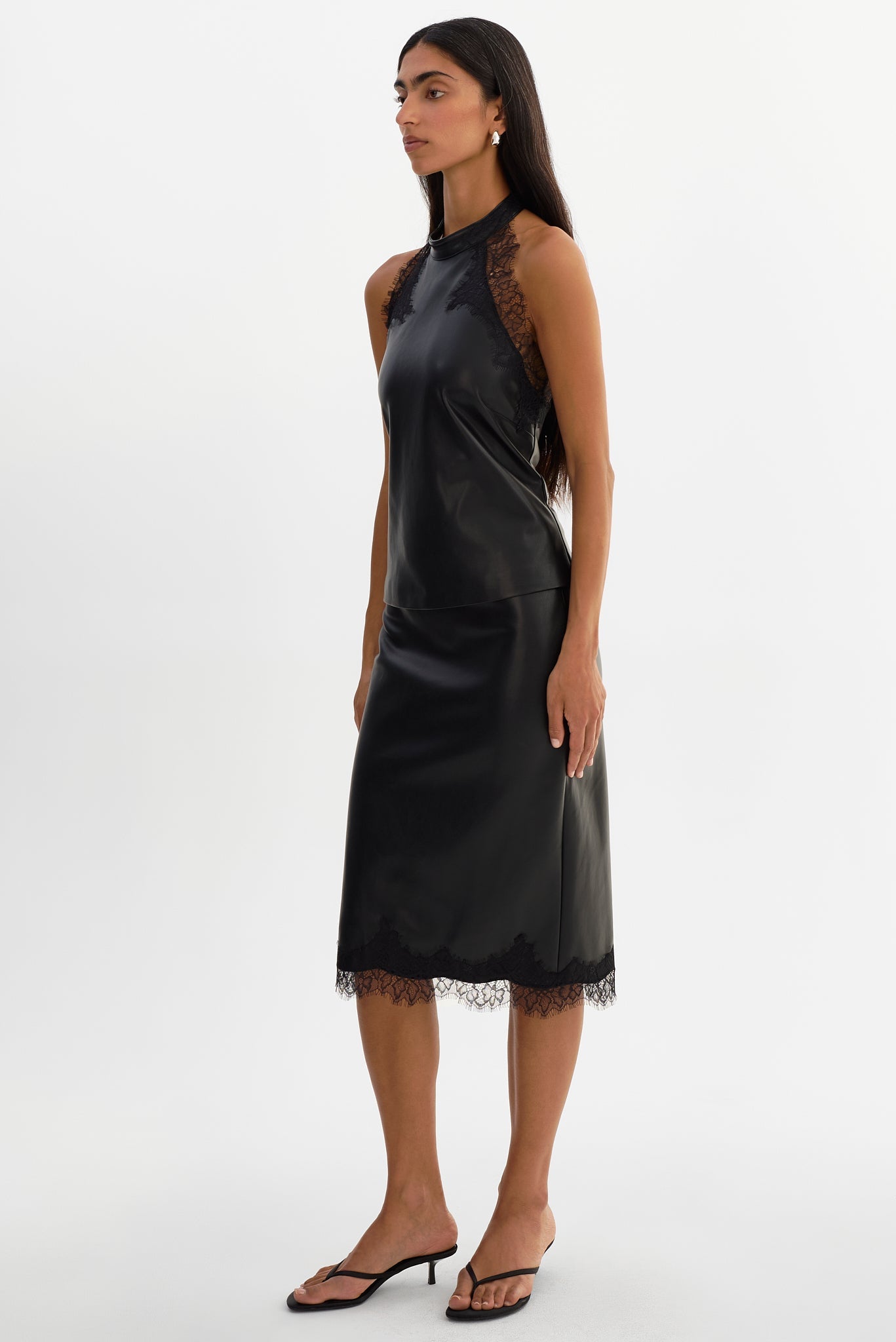 SONJA
Lace Trim Faux Leather Skirt