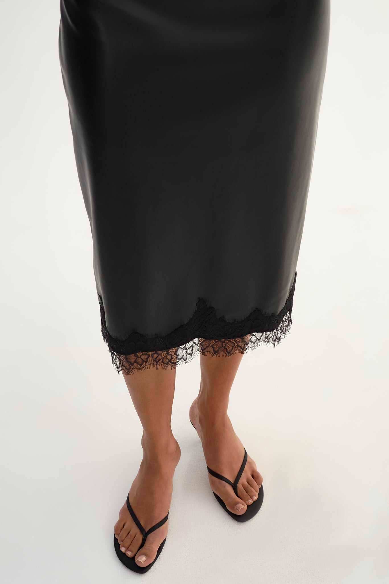 SONJA
Lace Trim Faux Leather Skirt