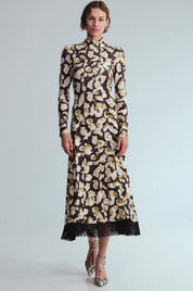 Troy Midi Dress
Spotted, fitted, fringed