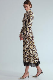 Troy Midi Dress
Spotted, fitted, fringed