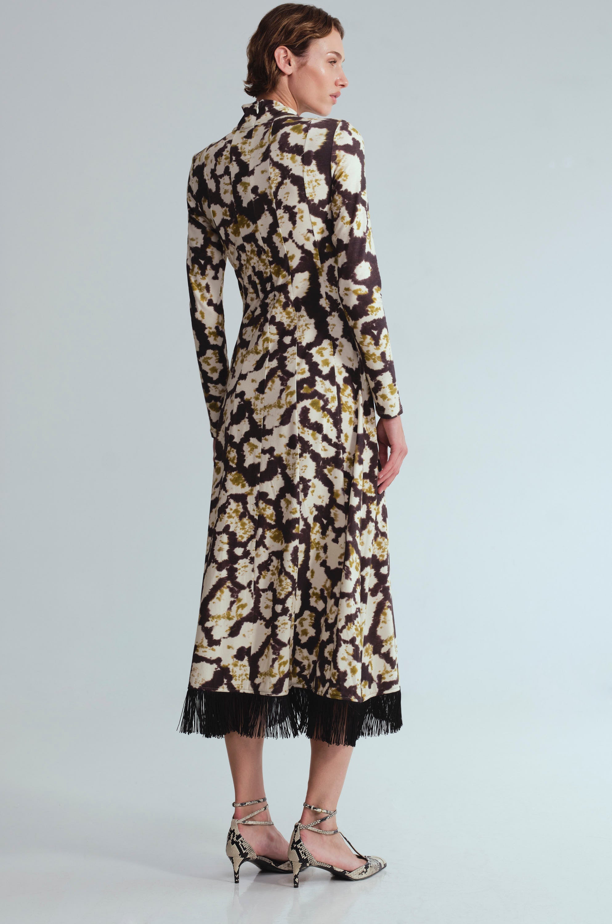Troy Midi Dress
Spotted, fitted, fringed