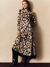 Troy Midi Dress
Spotted, fitted, fringed